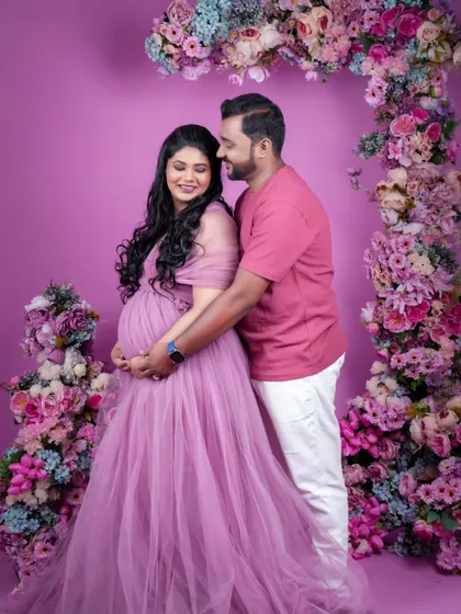 Another maternity shoot with a different theme. The dad-to-be's simple grooming ensures he looks polished and ready for these memorable photos.