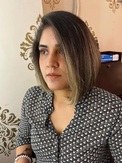 The inverted bob is shorter at the back and angles down towards the front.