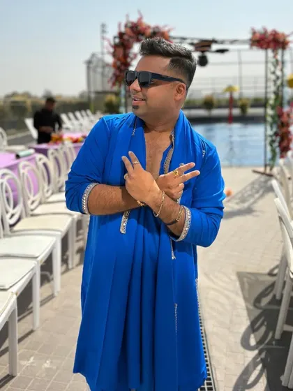 Striking a pose by the pool. The energy is building up, and I'm ready to channel it into an unforgettable Haldi celebration for the happy couple.