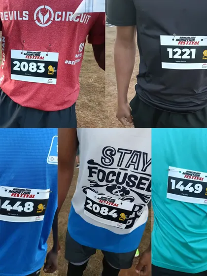 A collage of our race bibs from the Bangalore Mountain Marathon. Each number tells a story of an athlete's journey.