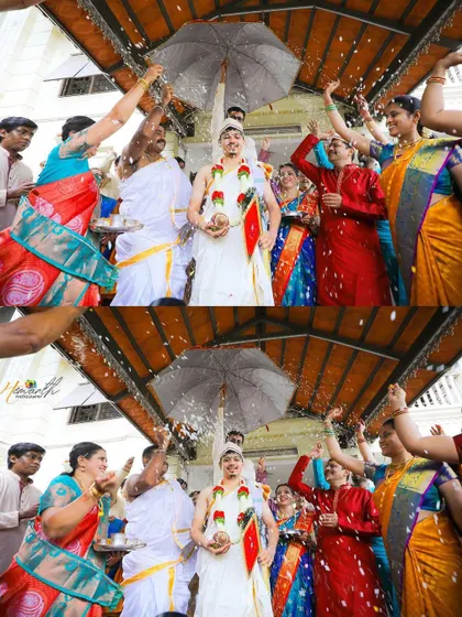A wide shot of the Kashi Yatra, showing the joyful participation of the entire family as they shower the groom with blessings and flowers.