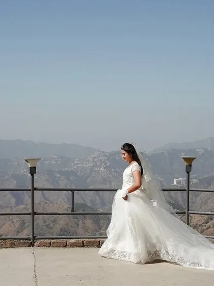 This is what we mean by making the landscape part of the story. We'll show you how to use composition and perspective to frame your subject against a vast mountain range, creating a sense of scale and grandeur that elevates a simple bridal portrait into an epic memory.