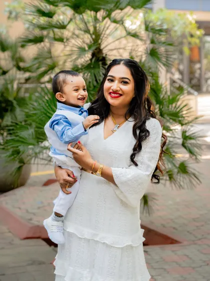 A happy mother and son at a family event. We make sure to capture beautiful portraits of guests and family members throughout the celebration.