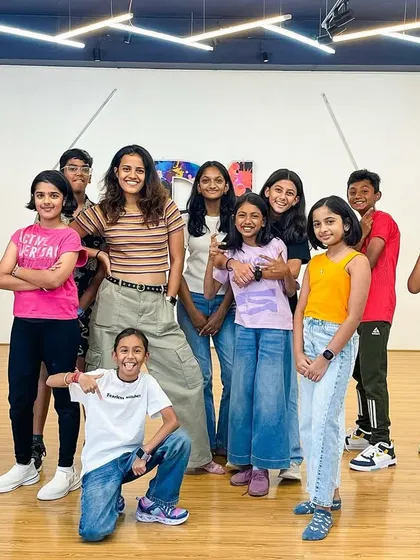 A group photo of our mentor Armitha with her senior kids' batch. We danced the most in March.
