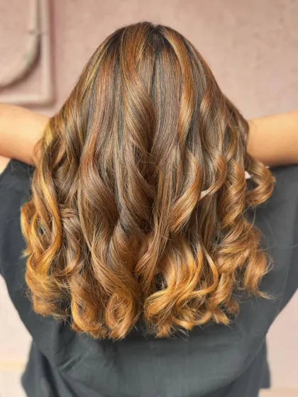 A back view of this stunning honey blonde. The color is so rich and vibrant, even without bleach. (No filter)