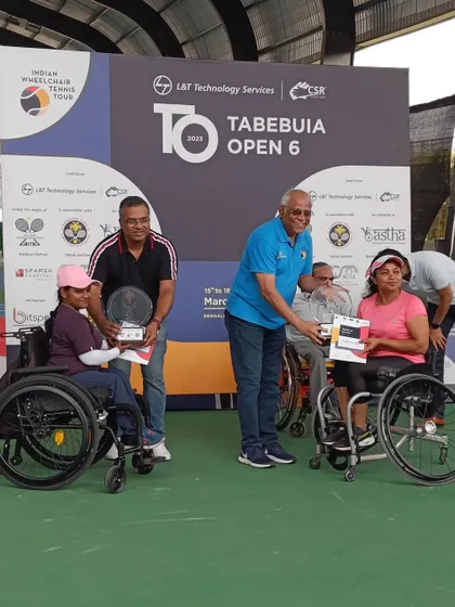 The women's doubles winners are honored at the Tabebuia Open closing ceremony. We are committed to providing competitive opportunities for female athletes.