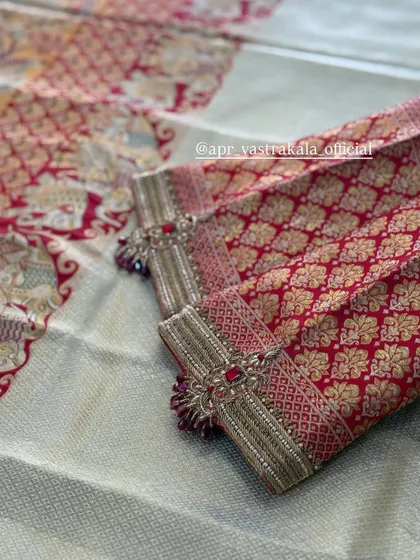 A unique sleeve design with brocade and beadwork.