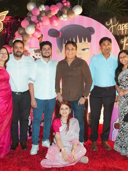 We make sure to get great shots of all your friends and family. This is a happy group photo of the guests enjoying the celebration at Raavi's birthday party.