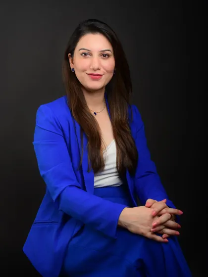 A three-quarter portrait that feels both professional and elegant. The vibrant blue suit makes a strong statement, perfect for a branding portfolio.
