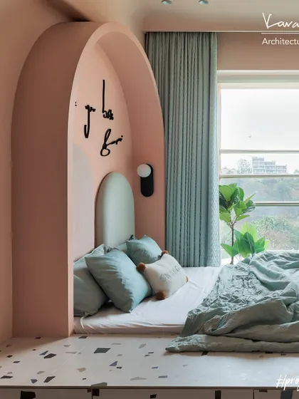 The bed in the Red Fort kids' room is set into a beautiful arched alcove, creating a cozy and protected feeling. The platform base includes built-in drawers for toys and clothes.