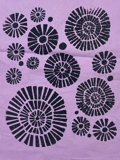 A modern, geometric block print pattern created by a student. This technique is versatile and can be used for both traditional and contemporary designs.
