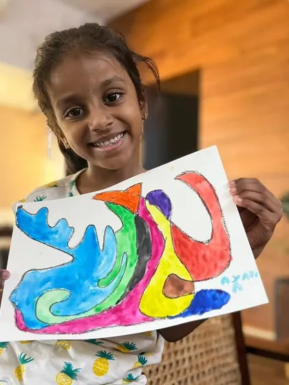 A duplicate of ID 98, this student's happiness with her artwork is a testament to the encouraging environment of our online classes.