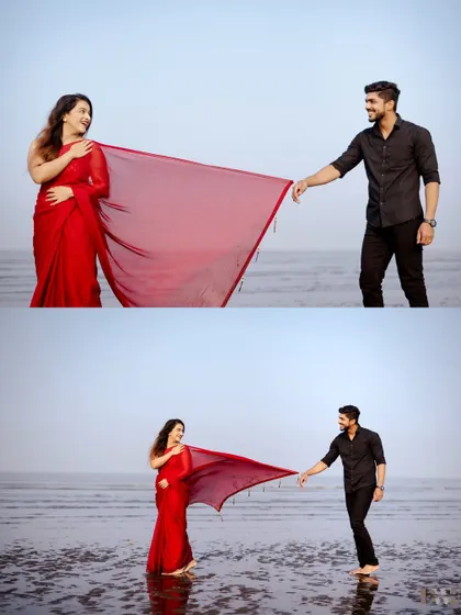 A playful tug on the saree against the backdrop of the ocean. This dynamic shot captures a classic romantic gesture with a sense of fun and movement.