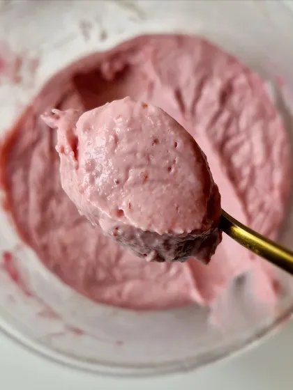 A spoonful of luscious Strawberry Yogurt Mousse, a light and airy filling.