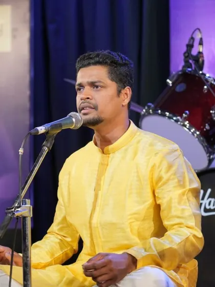 A candid shot of student Hari Kishan K during the devotional performance.