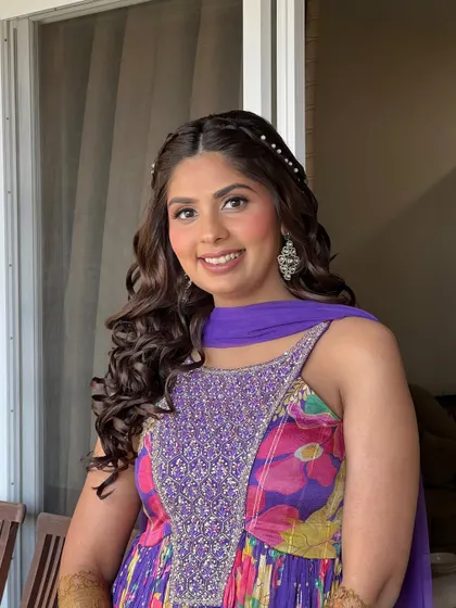 A final, smiling portrait from her Mehendi day.