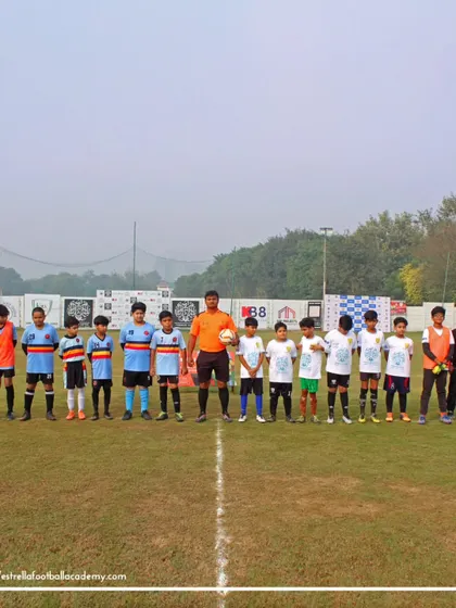 Our team lining up with the opposition before a Golden League match. These moments teach sportsmanship and respect for the opponent.