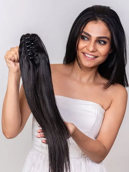Another look at our clutch ponytail, showing the secure clutch mechanism that makes it so easy to attach for an instant hair makeover.