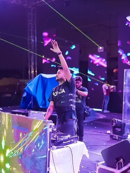 On stage at the BGI Timelapse festival. The laser beams and confetti create a stunning visual spectacle.