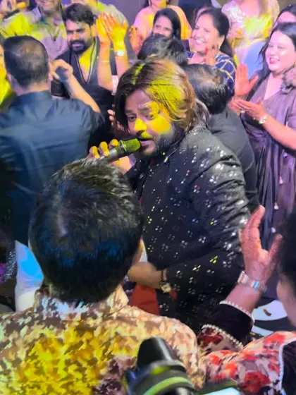 Getting off the stage and into the crowd, sharing the microphone and the moment. I believe in breaking the barrier between the performer and the audience to create a true 'mehfil'.