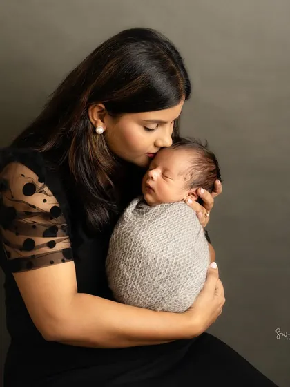 There is nothing more powerful than a mother's love. In the quiet moments of a newborn session, I focus on capturing that profound, gentle connection.