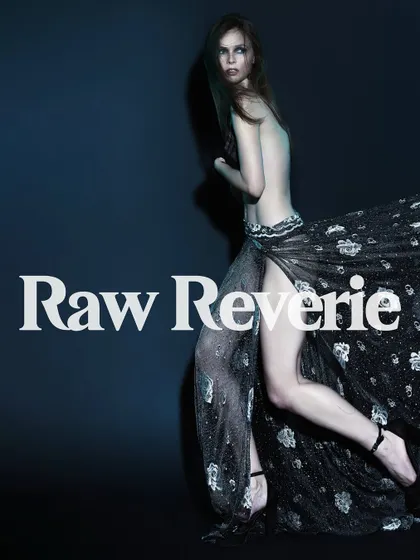 A motion shot from "Raw Reverie." The model's stride and the flowing skirt create a sense of graceful movement.