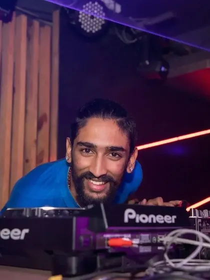 A smile for the camera while spinning a techno set at K-Town Bar. While I'm known for Bollywood, I also love to switch it up and dive into different genres.