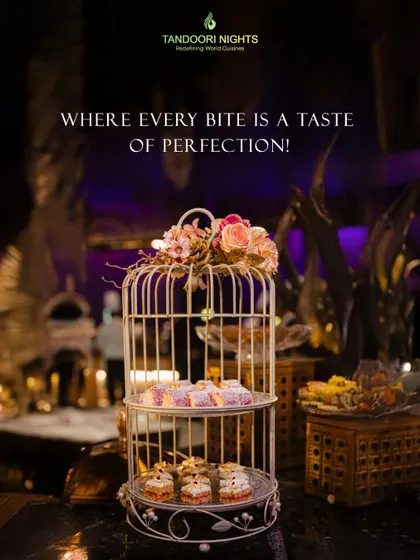 Another view of our elegant birdcage dessert stand, showcasing where every bite is a taste of perfection in a beautifully lit, ambient setting.