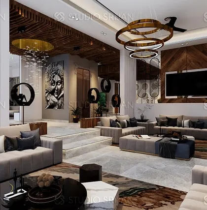 A grand, multi-level living and dining space in Alameda, Gurgaon. The design uses different ceiling treatments and art pieces to define various zones within the large hall.