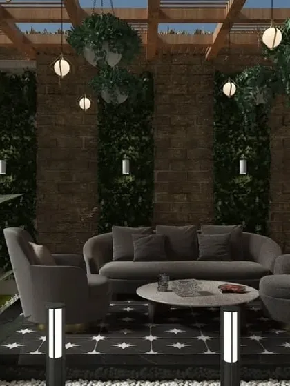 A close-up of the proposed seating area in the Bulandshahr design. The combination of patterned flooring, stone walls, and hanging plants creates a rich, textured look.