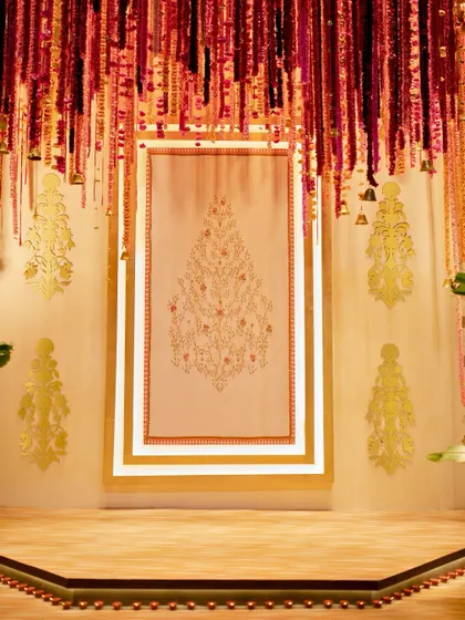 A hand-embroidered 'Tree of Life' fabric panel, a central design element that brought deep meaning and artistry to the wedding ceremony.