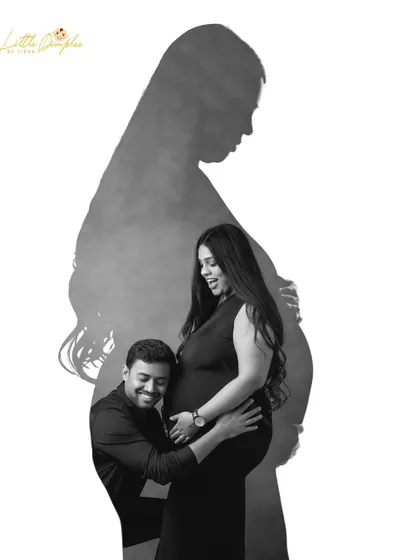A creative black and white portrait that tells a story of connection. Using shadow and light, I created this artistic silhouette to represent the powerful presence of motherhood.