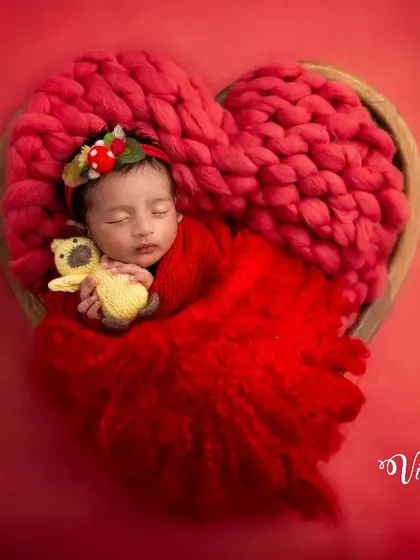 Adding a tiny prop like this little bear can bring a touch of sweetness and personality to a themed shoot. The baby seems to be cuddling the bear in their sleep.