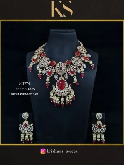 An exclusive uncut Kundan set with a statement necklace and matching earrings. This piece is available with ruby red accents.