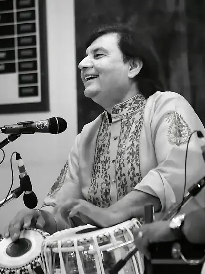 The joy of music is something that comes from within. This photograph captures a moment of 'lutf' or pure enjoyment during a solo performance, where the music simply takes over.