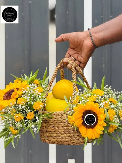 This mango and sunflower basket is a slice of summer bliss. It's a simple, fresh, and beautiful gift that combines the sweetness of handpicked mangoes with the cheerfulness of sunflowers.