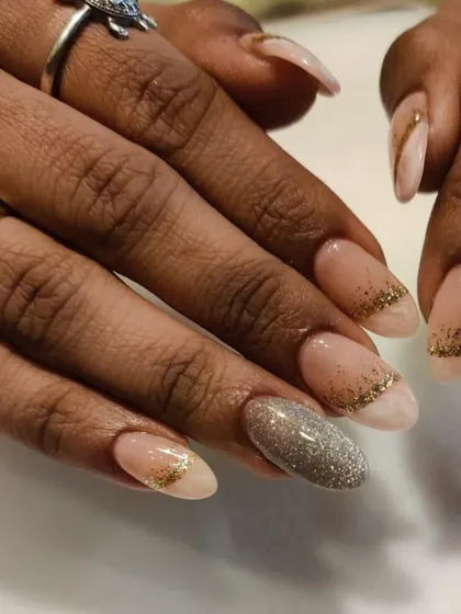 Perfect for wedding season, this elegant design features a marble base with a delicate gold glitter fade and a full silver glitter accent nail.