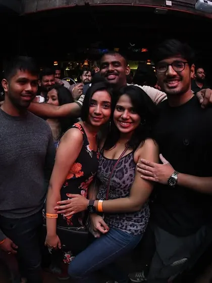 A snapshot of the crowd enjoying the night. It's all smiles and good times.