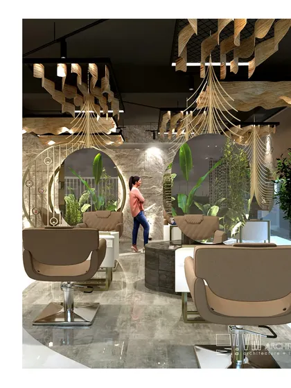 The main styling area at Azhak Makeover Studio, where functionality meets high design. The custom mirrors, ergonomic chairs, and integrated planters are all part of a design that is both beautiful and practical for stylists and clients.