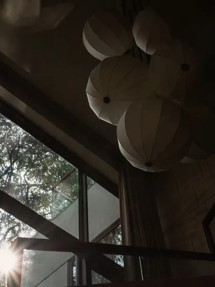 Chasing light in the stairwell at Pràna. This cluster of paper lanterns becomes a magical sculpture as the sun moves across the sky, casting beautiful shadows.