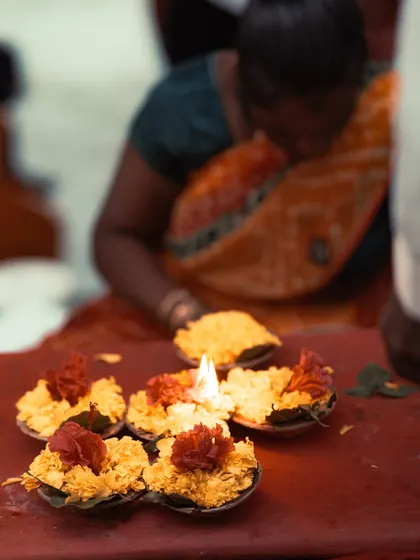 Diyas and flower offerings being prepared for the Ganga Aarti. I love capturing these small details that are an integral part of the ritual.