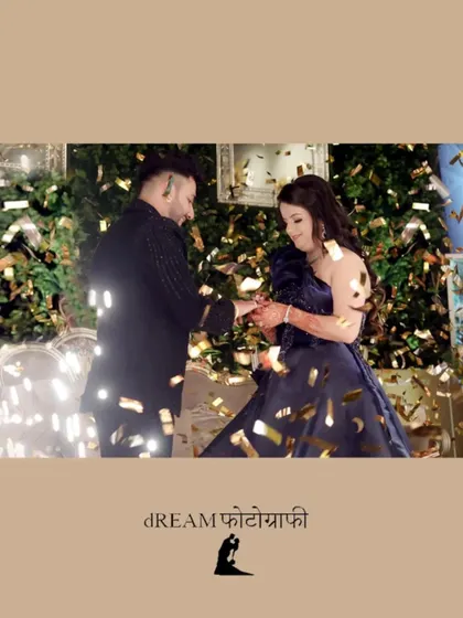 The magical moment of the ring exchange between Samridhi and Manav, showered in golden confetti.