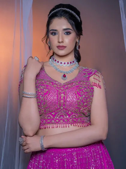 A portrait from the magenta lehenga shoot, showcasing the diamond and ruby jewelry.