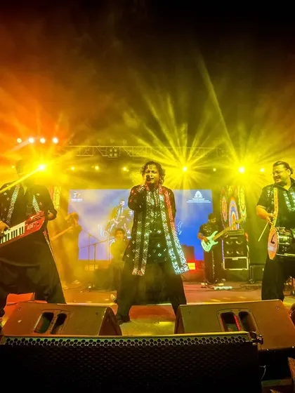 The band in full swing, with the keytar, vocals, and percussion creating a rich wall of sound.