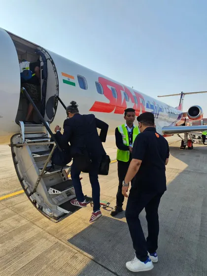 A fun shot of Chef Vikas and his team boarding a plane for an exclusive out-of-town event.