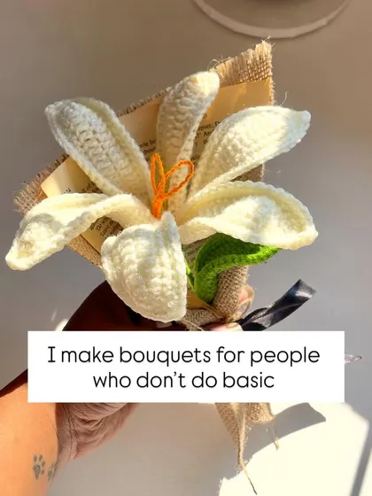 For those who don't do basic. This single, beautifully crafted white lily is wrapped in burlap and makes a statement of simple elegance. It's a unique alternative to a traditional bouquet.