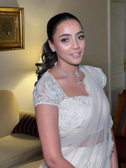 A close up on that unapologetically dewy skin. I used highlighting techniques to catch the light from every angle, creating a radiant look that is perfect for an evening reception.