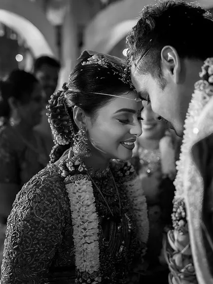 Sometimes, the most profound moments are the quietest. I used a black and white palette here to focus on the intimacy and emotion of this ritual, a timeless memory of a sacred promise being made.