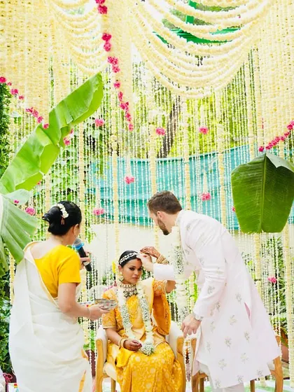 The sacred moment of the Mangalya Dharanam in a South Indian ceremony. We ensure that every ritual is understood and beautifully executed, making the experience meaningful for everyone involved, regardless of their background.