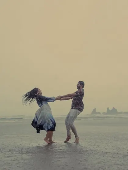 Some couples wait for the storm to pass; others dance in it. We captured this unscripted, joyful twirl during a sudden downpour in Goa. It’s a perfect example of how we find beauty in unplanned moments, creating images that are full of life and genuine emotion.